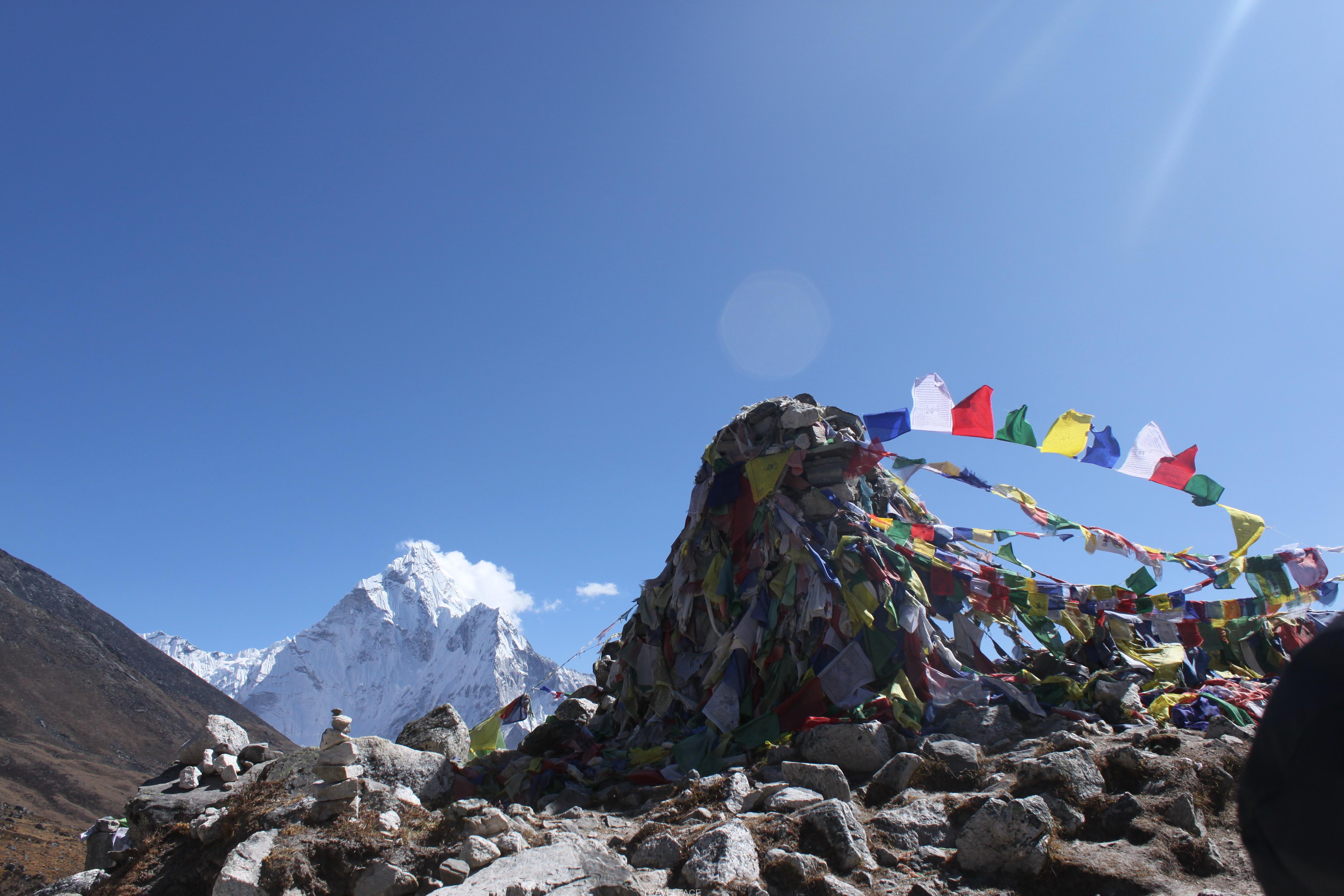 Prayer flags with the mountains in the background