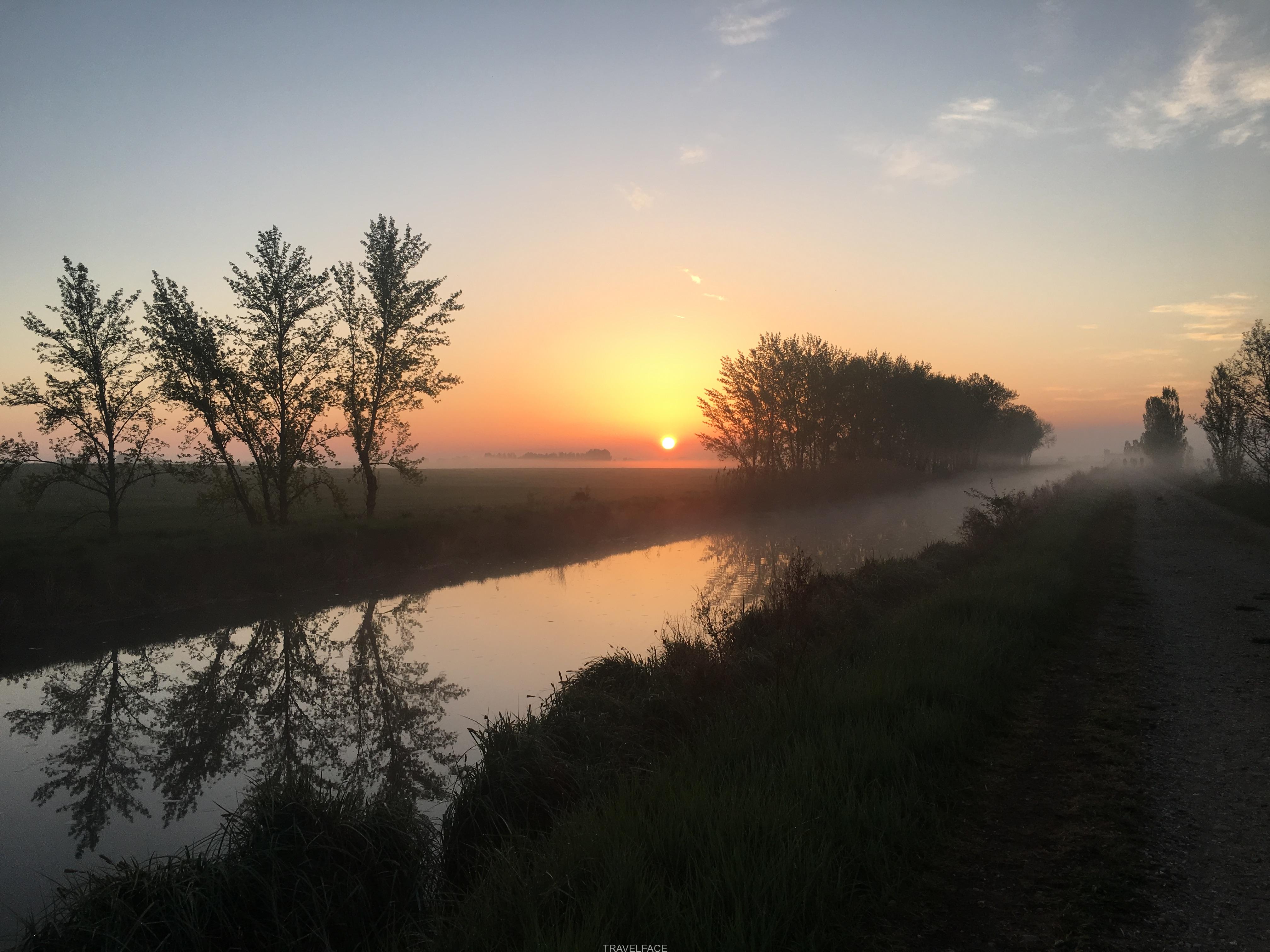 Sunrise over river on the Camino