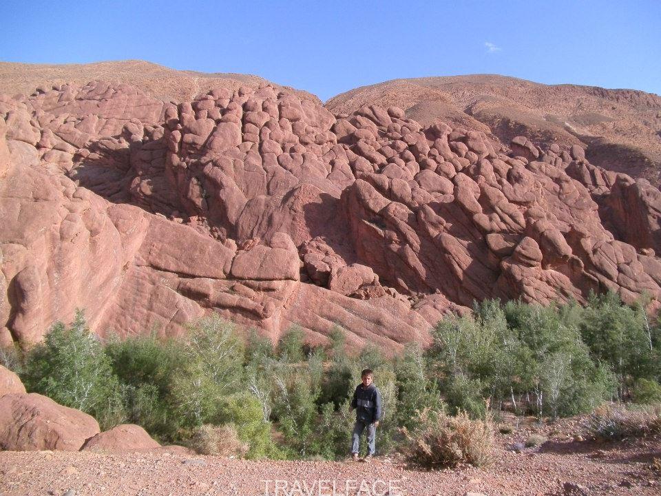 Tamnalt rock formations and a local boy, Morocco road trip