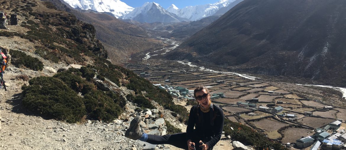 Above Dingboche, pulling a pose